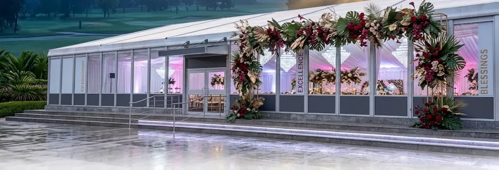 The venue dressed with a tropical floral installation